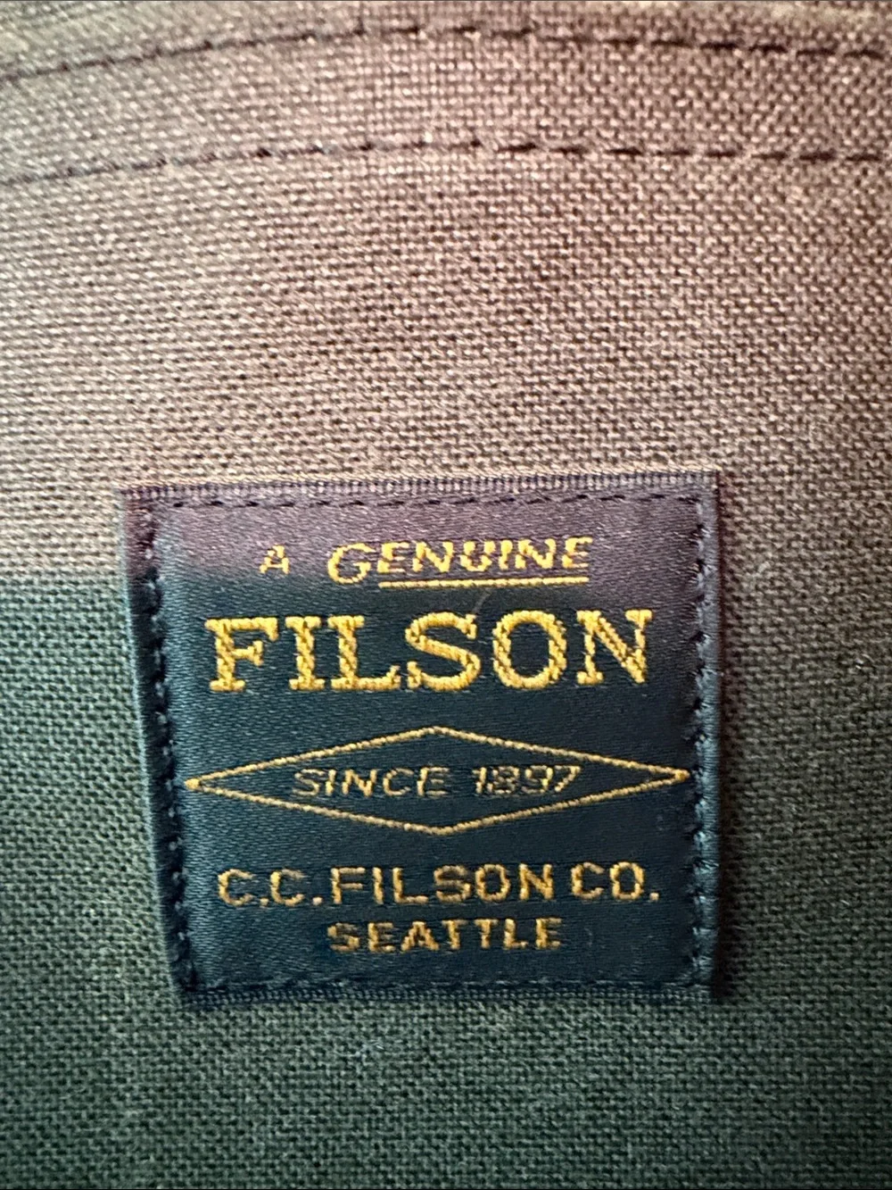 Like new Filson Tincloth Compact Briefcase with Dark Brown Leather